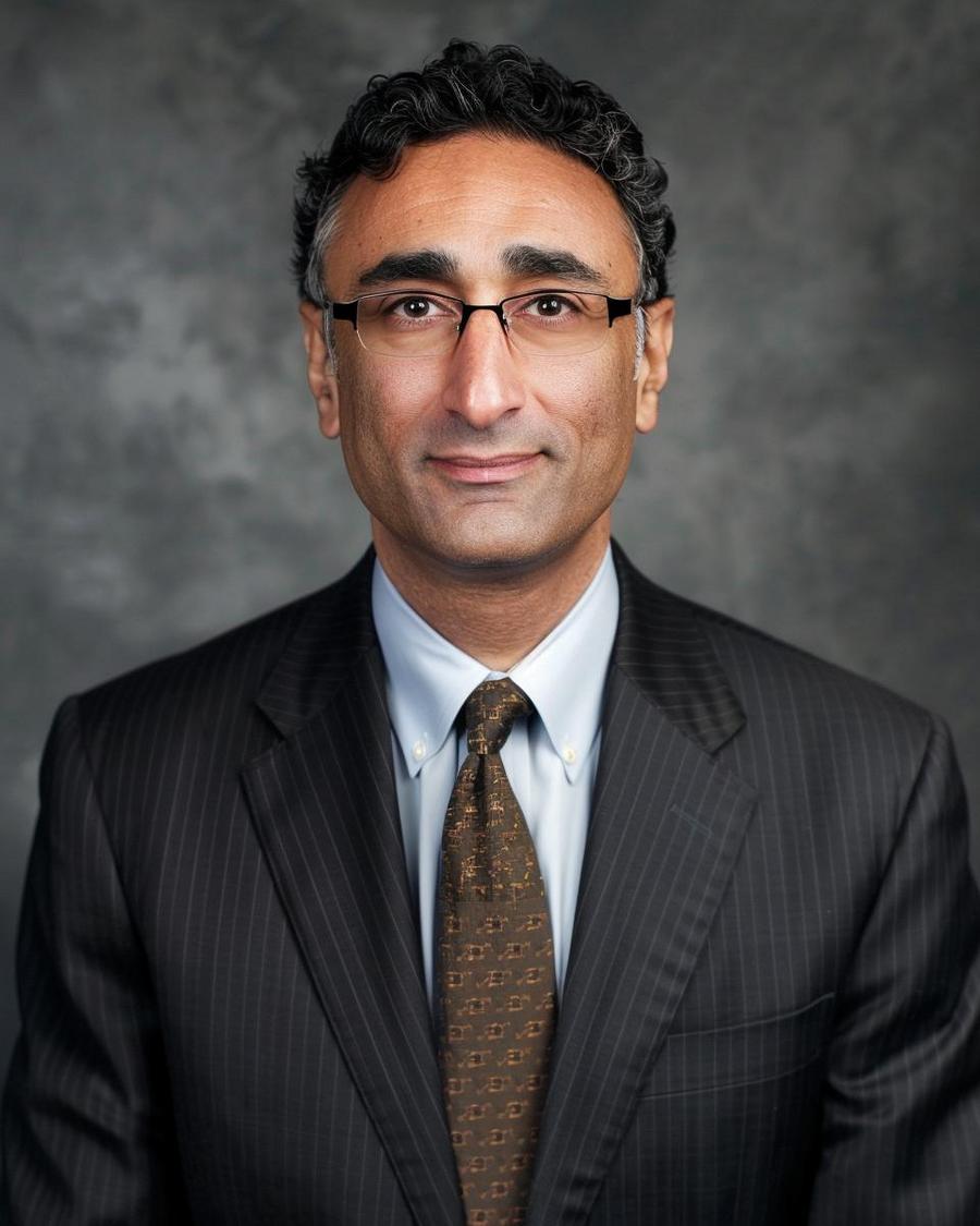 How Does Neal Katyal Invest His Earnings? Neal Katyal net worth growth illustration through smart investment strategies.